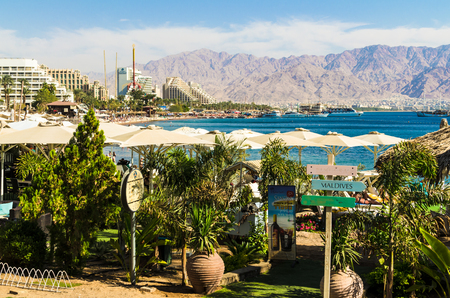 EILAT, ISRAEL - November 7, 2017: Eilat, Israel. Eilat, on the background of urban white buildings and mountain peaks. Travel and tourism conceptのeditorial素材