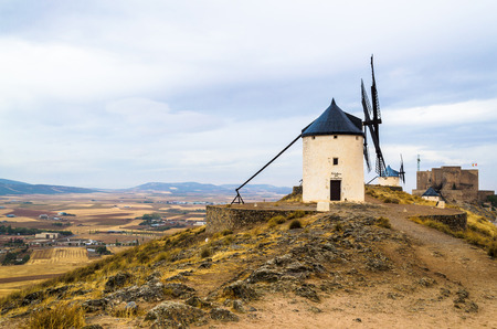 View of the windmill of Cervantes Don Quixote in Consuegra, Toledo, Castile La Mancha, standing on the hill, Spain, Europe. Consuegra is famous due to its windmills.の写真素材