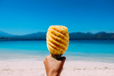 Pineapple at the beachの写真素材