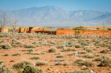 Aouli, Morocco - April 10, 2015. Huge amount of rubbish dispersed in desert between abandoned ruinsの写真素材