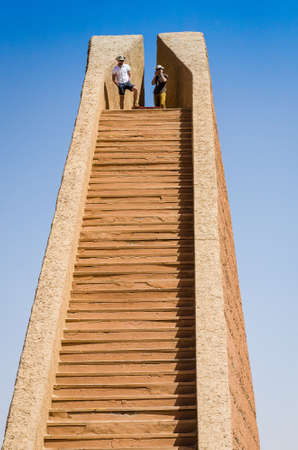 Erfoud, Morocco - April 15, 2015. Desert architecture by Hannesjorg Voth is a 16m high stairway with 52 steps leading to an entrance at the top in the middle of desertのeditorial素材