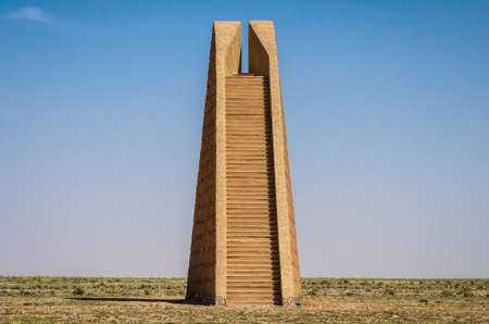 Erfoud, Morocco - April 15, 2015. Desert architecture by Hannesjorg Voth is a 16m high stairway with 52 steps leading to an entrance at the top in the middle of desertのeditorial素材