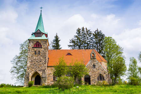Neo gotic Church Of The Divine Heart Of The Lord in small village Borovnicka in Podkrkonosi region in Czech republicの写真素材