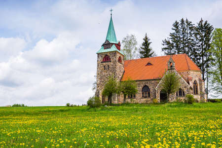 Neo gotic Church Of The Divine Heart Of The Lord in small village Borovnicka in Podkrkonosi region in Czech republicの写真素材