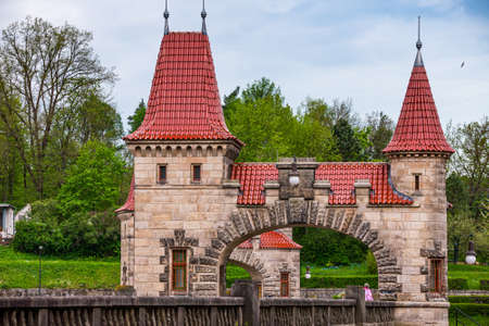 Czech republic, Talsperre Les Kralovstvi (Forest Kingdom) - May 15, 2021. Historic hydraulic water dam with orange water in river Elbeのeditorial素材