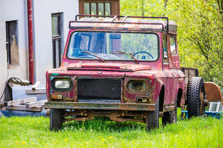 Borovnicka, Czech repubic - May 16, 2021. Old heap of red ARO 240 off road car