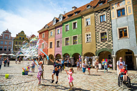 Poznan, Poland - August 09, 2021. Tiny colored houses - main dominant of main square - in Summerのeditorial素材