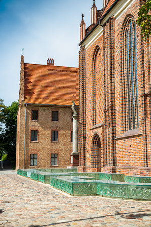 Poznan, Poland - August 09, 2021. Area of Poznan Cathedral - Bazylika Archikatedralna sw. Apostolow...