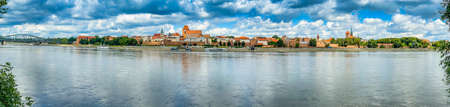 Torun, Poland - August 11, 2021. Panoramic view on the Old Town of the opposite side of the riverのeditorial素材