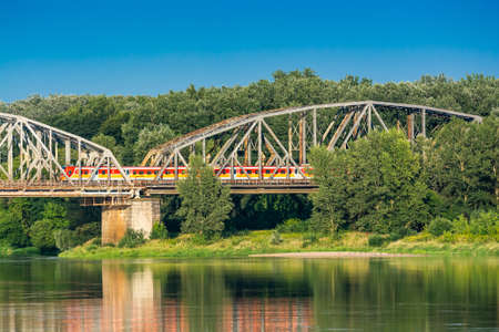 Torun, Poland - August 11, 2021. Ernest Malinowski Railway Bridge - Most kolejowy im. Ernest Malinowski - in Summerのeditorial素材