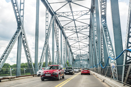 Torun, Poland - August 11, 2021. Reconstruction of Jozef Pilsudski bridge over Wisla river in Summer...