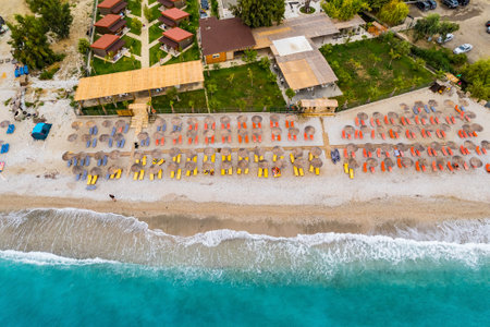 Aerial view of Bunec Beach area with beach umbrellas in Summer 2022, Albaniaの写真素材