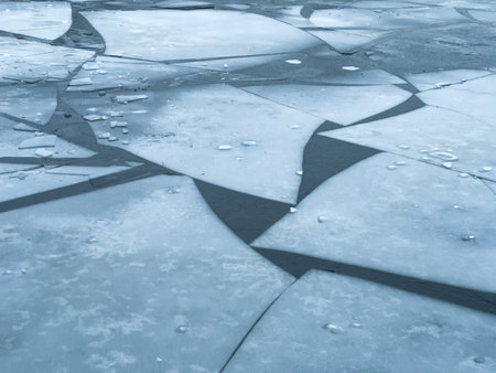 Ice floes on river surface in Prague, Czech Republic, Winter 2023の写真素材