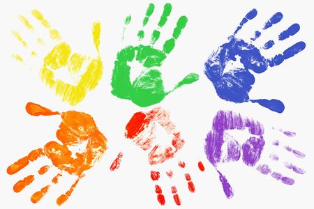 Handprints with the LGBT colors on a light background. The gay-lesbian movement. LGBT concepの写真素材