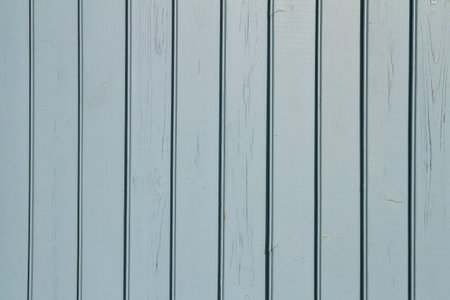Light blue wood background pattern. Wooden texture aqua color. Closeup.