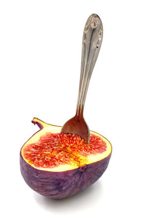 Figs slice isolated on white background with shadow. A half figs with a metal spoon in itの写真素材