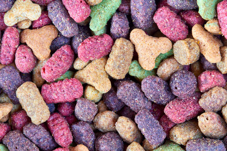 Dry food for cat or dog. Background from pet food. Closeup