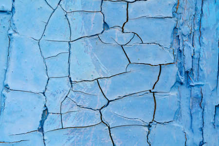 Cracked blue paint as background or textureの写真素材