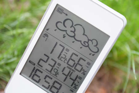 Weather station device with weather conditions inside and outsideの写真素材