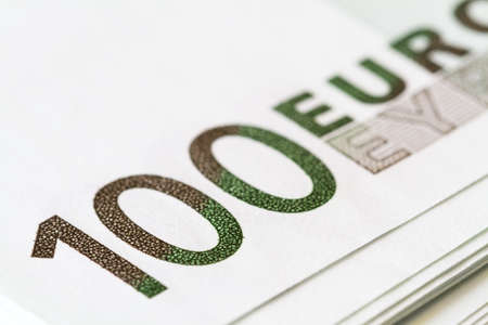 One hundred Euro banknote details in a macro shot. Selective focusの写真素材