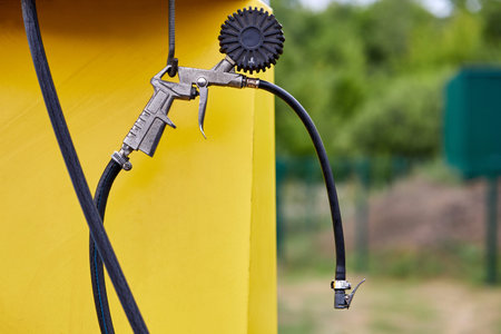 Pressure gauge and pistol of compressor unit for inflating tires at gas stations