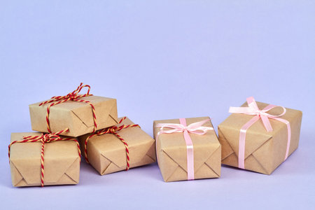 Christmas or New Year gift boxes on a purple background