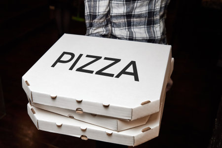 Pizza boxes prepared for deliveryの写真素材