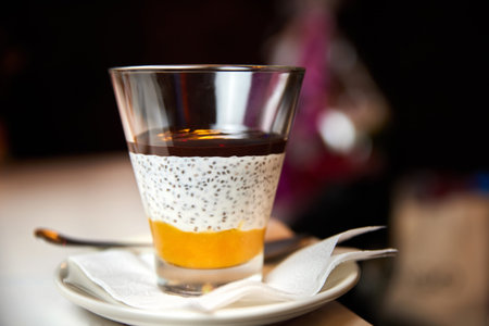 Creamy Dessert with jam and Chia Seed. Close-up, selective focus