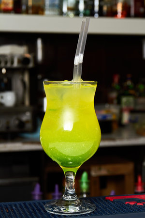 Green Joy Cocktail. Vodka, orange, pineapple juice, banana and mint syrupの写真素材