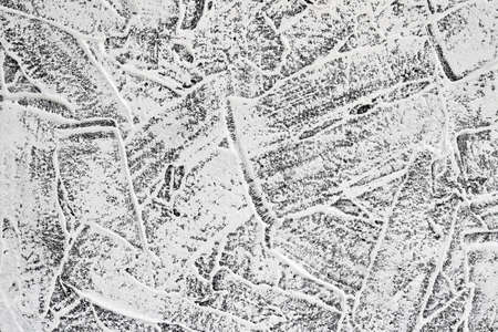 Gray grooved stucco on wall. Plaster patterned texture or background. Closeupの写真素材