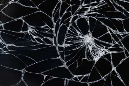 Broken display screen - white lines on black background, design element. Closeup, selective focus