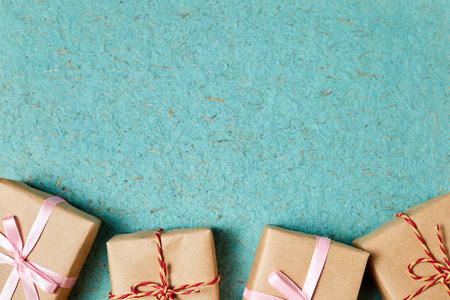 Christmas gift boxes on blue design paper background