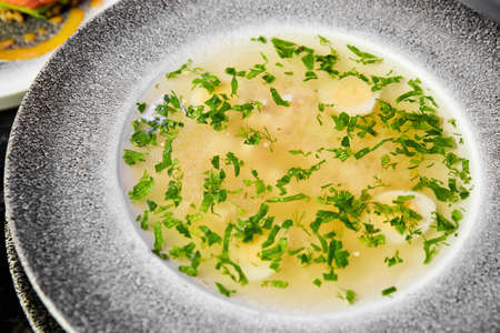 Noodle soup with chicken and quail eggの写真素材