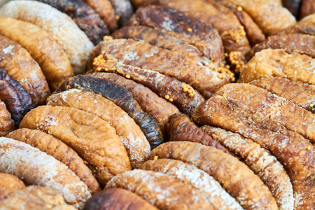 Organic dried figs close-up as vegetarian food backgroundの写真素材