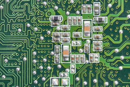 Resistors, capacitors, transistors on an electronic computer printed circuit board