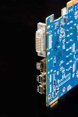VGA, HDMI, DP connectors on the Computer graphics card on black background