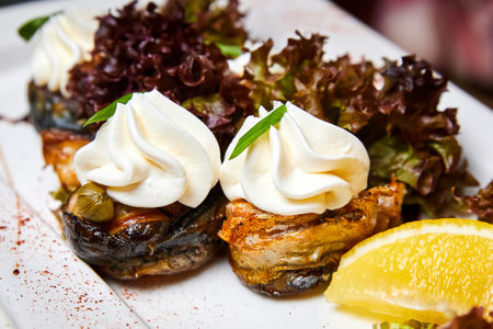 Mackerel rolls with capers and cheese creamの写真素材