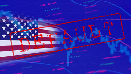 Red DEFAULT inscription against the background of the US flag and falling stock chartsの写真素材