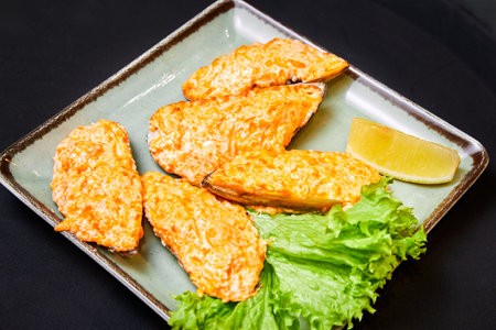 Mussels baked under a cheese capの写真素材