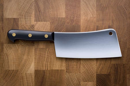 Meat cleaver on butchers block backgroundの写真素材