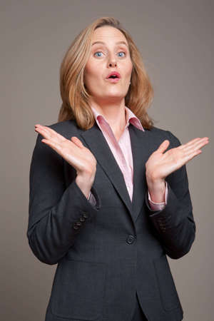 Portrait of businesswoman clapping her handsの写真素材