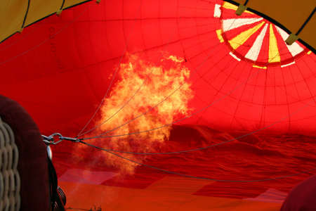 Fire blows out hot air balloonの写真素材
