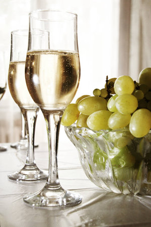 Glasses of wine and grapesの写真素材