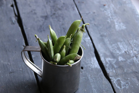 green beans in the metal mug.の写真素材