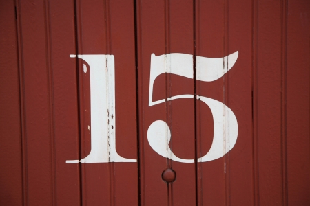 Numbers painted on the sides of old railway boxcars from the early to mid 1900の写真素材