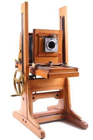 Wooden old camera on a white background.の写真素材