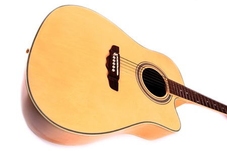 Wooden guitar on a white background.の写真素材