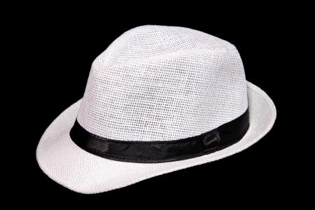 Very stylish white hat on a black background.の写真素材