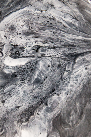 Artistic decoration made of golden resin. Epoxy resin paint, abstract backgroundの写真素材