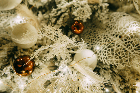 Vintage handmade Christmas tree toy hanging on a Christmas tree.